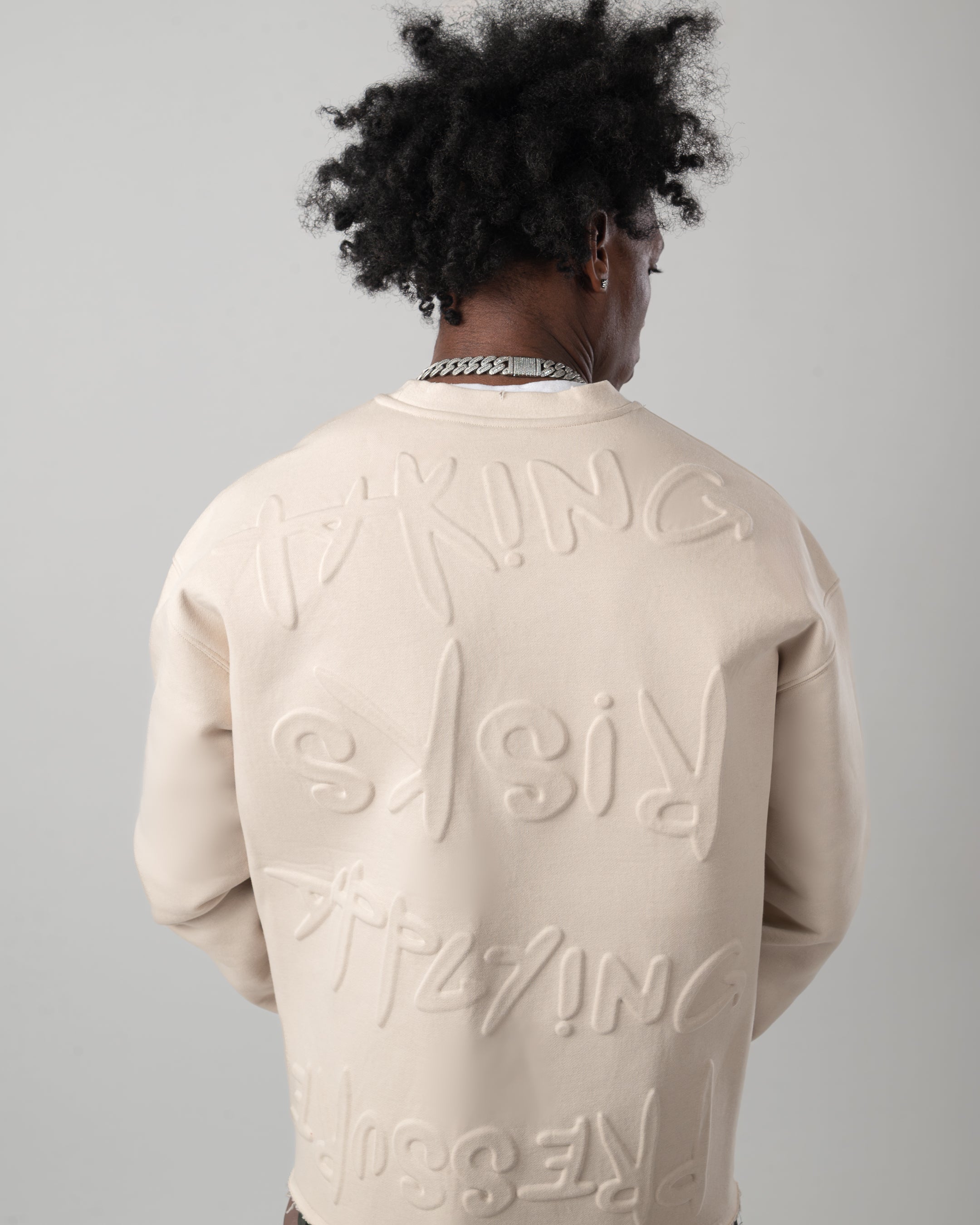 Taking Risks Embossed Crewneck-Sand