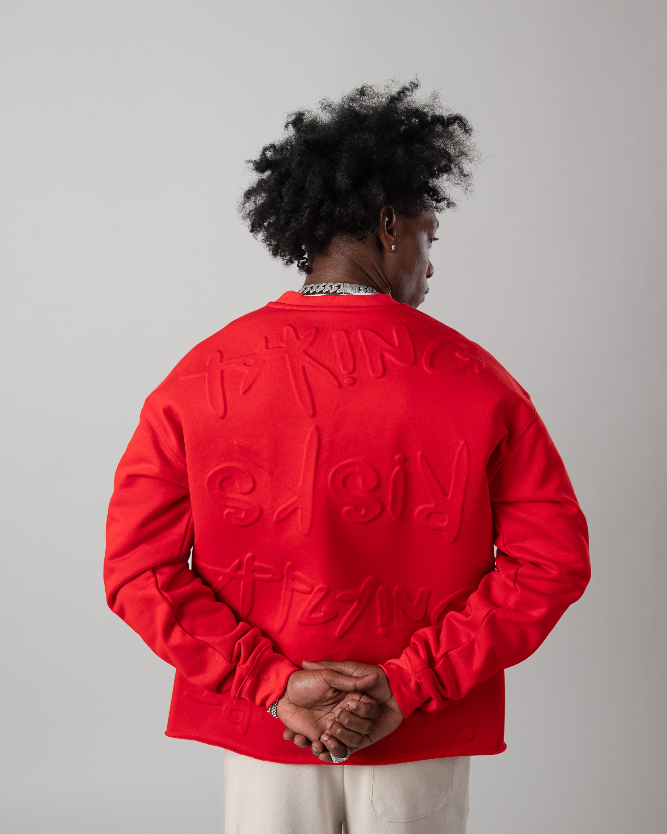 Taking Risks Embossed Crewneck-Red